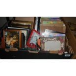 A box of assorted photo frames.