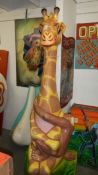 A Falgas fibre glass large giraffe with monkey.
