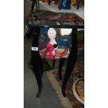 A side cabinet depicting Marilyn Monroe.