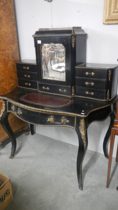 A Victorian black lacquered ladies desk