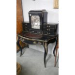 A Victorian black lacquered ladies desk
