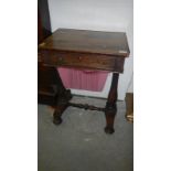 A Regency rosewood works sewing table