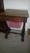 A Regency rosewood works sewing table
