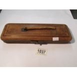 A 19th century glove case (handle a/f) containing a pair of 19th century ivory glove stretches.