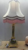 A good quality brass table lamp with shade.