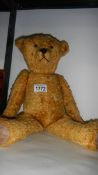 A quantity of hump back straw filled teddy bears,