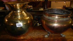 A brass vase and a jardiniere.