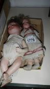 2 Victorian porcelain dolls.