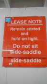 2 Pleasure Island carousel 'Please do not sit side saddled' signs.