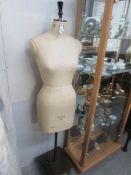 A Kennett & Lindsell Ltd (K & L) Mannequin - series CSI, size 12, with base.