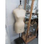 A Kennett & Lindsell Ltd (K & L) Mannequin - series CSI, size 12, with base.