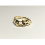 A 14ct gold sapphire and diamond 'Hand of Fatima' ring, size L.