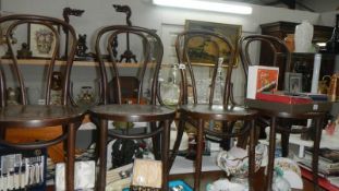 A set of 4 bentwood chairs.