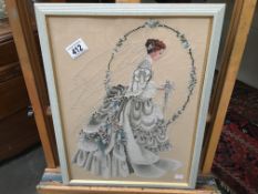 A hand embroided picture of a bride