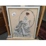 A hand embroided picture of a bride