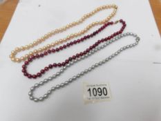 3 Honora pearl necklaces in silver, gold and red.