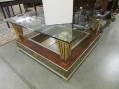A large glass topped coffee table.