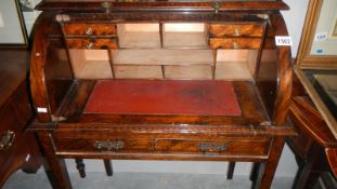 A 19th century barrel top bureau