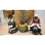 A lidded pot depicting see/hear/speak no evil monkeys and 2 other figures.