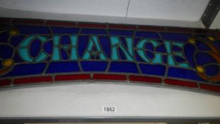 A Victorian leaded 'Change' stained glass panel from Brighton Pier arcade