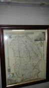 A framed and glazed map of East Anglia.