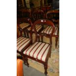 5 mahogany dining chairs.