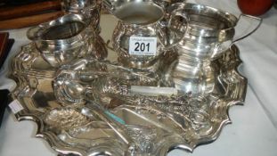 A silver plate tray, jugs, cutlery etc.