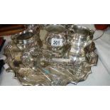 A silver plate tray, jugs, cutlery etc.