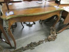 A 19th century marquetry centre table.