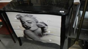 A 3 drawer chest depicting Marylin Monroe.