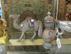 An old white metal camel and ewer decorated with coral, lapiz, turquoise etc.