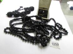 A quantity of Whitby jet and French jet jewellery.