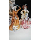 A Royal Doulton figurine and 2 others.