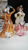 A Royal Doulton figurine and 2 others.