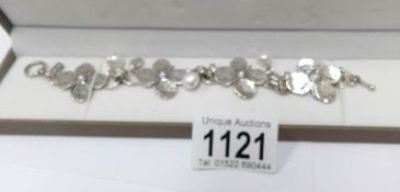 An Hajit Gorali silver/pearl daisy bracelet.
