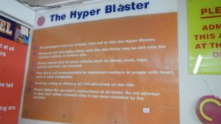 A Pleasure Island Hyperblaster sign.