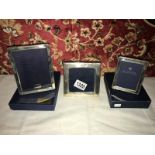 3 silver photograph frames, all hall marked, 2 boxed.