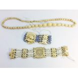 An ivory necklace & 2 ivory bracelets