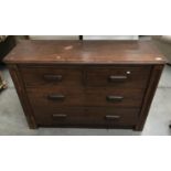 A medium oak 4 drawer chest of drawers
