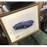 A framed and glazed print of a Jaguar E Type bearing the signatures of Stirling Moss,