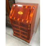 A good modern inlaid pine bureau