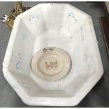 A Jemma toy bath and a nursery plate