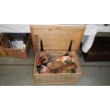 A chest & contents of tools including level & other contents including gun hilt