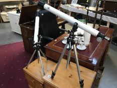 2 telescopes on tripods and 1 spare tripod