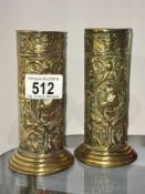 A pair of embossed brass vases A/F (one has split that needs soldering)