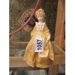 A Royal Worcester figurine 'Grandmother's Dress'.