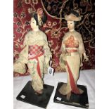 A pair of Geisha dolls.