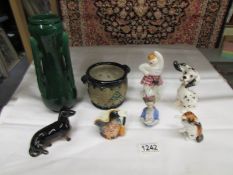 8 ceramic items including Beswick dachsund, Beswick Dalmation, Royal Doulton Highland Snowman,