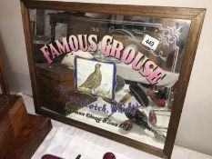 A Famous Grouse whisky advertising mirror