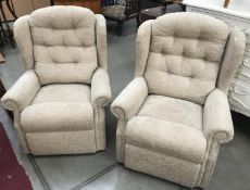A pair of fabric covered chairs